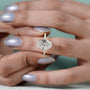 Timeless oval diamond ring hidden halo yellow gold