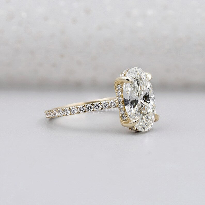 Lab grown oval diamond ring hidden halo yellow gold band