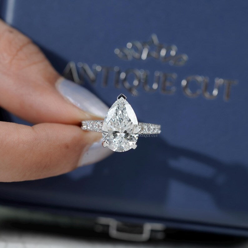 Modern pear diamond engagement ring white gold pave band