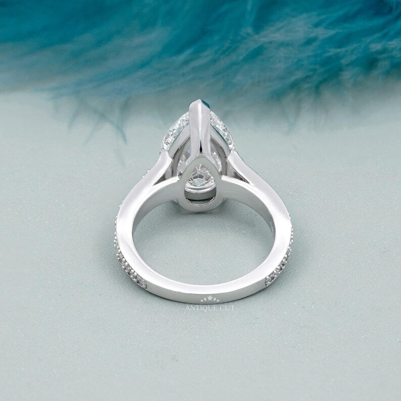 Elegant pear shape engagement ring pave diamonds white gold