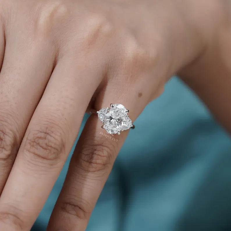 Minimalist oval diamond engagement ring three stone gold