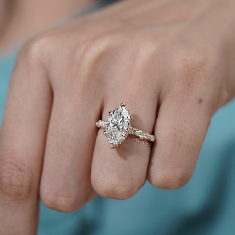 Statement marquise diamond ring yellow gold vintage band design