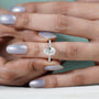 Oval shaped lab grown diamond ring with elegant pave design
