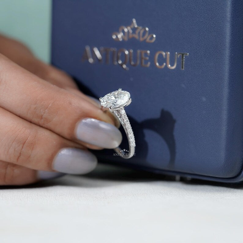 Luxury oval cut diamond ring with polished white gold band