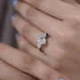 Oval shaped diamond ring with matching side stones