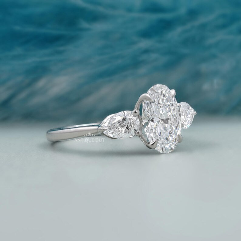 Elegant three stone oval diamond ring with brilliant sparkle