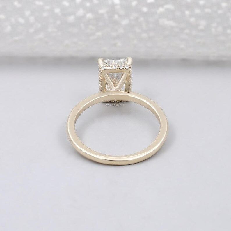 Yellow gold radiant cut engagement ring