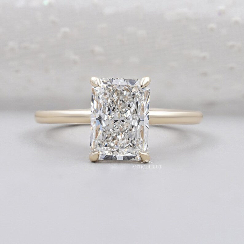 Radiant cut diamond ring solitaire yellow gold