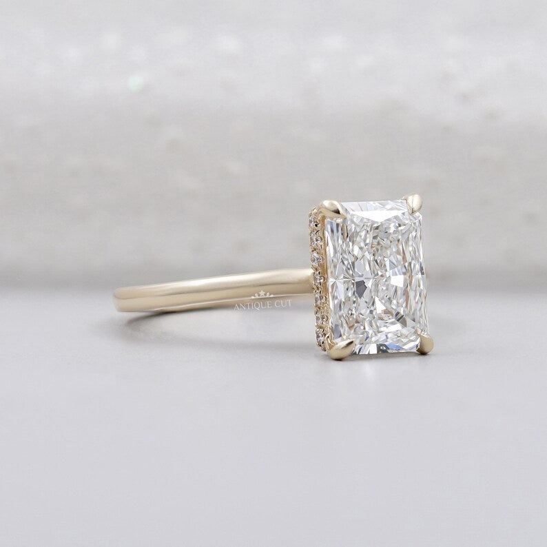 Hidden halo engagement ring radiant cut diamond