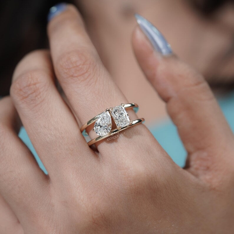 Yellow gold ring with two diamonds side by side
