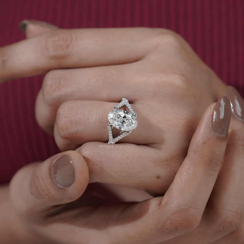 Brilliant oval engagement ring hidden halo