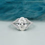 Split shank oval cut engagement ring white gold