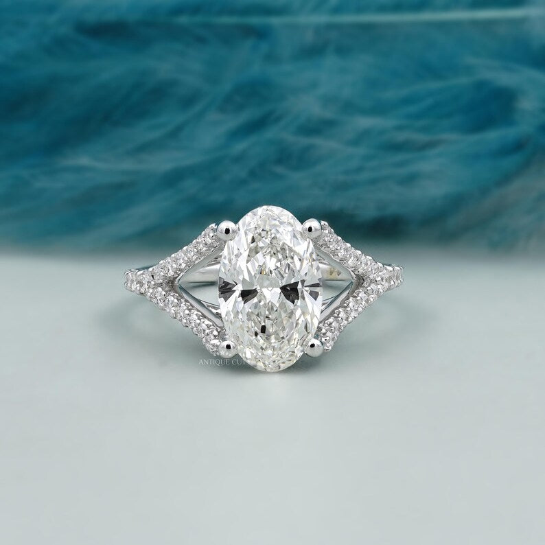Split shank oval cut engagement ring white gold