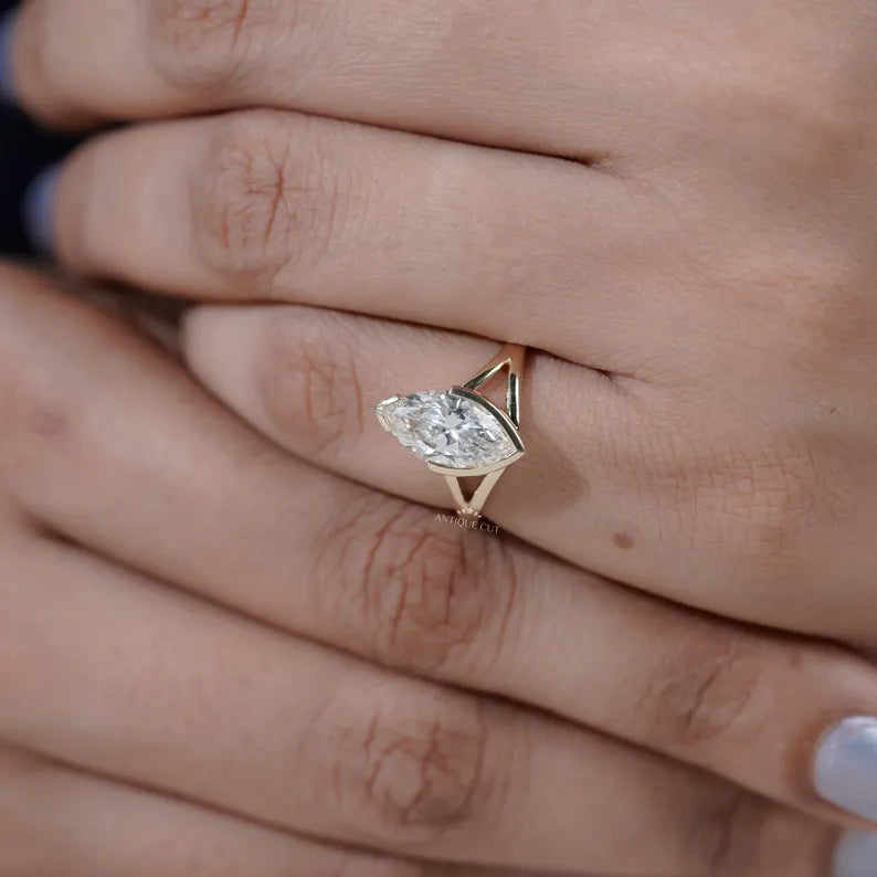 Marquise shaped diamond ring with elegant split shank
