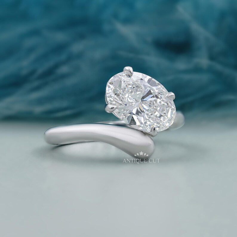 White gold oval solitaire diamond ring