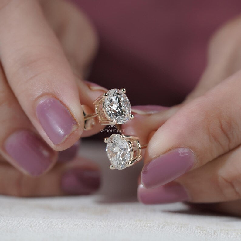Brilliant round cut diamond earrings close up