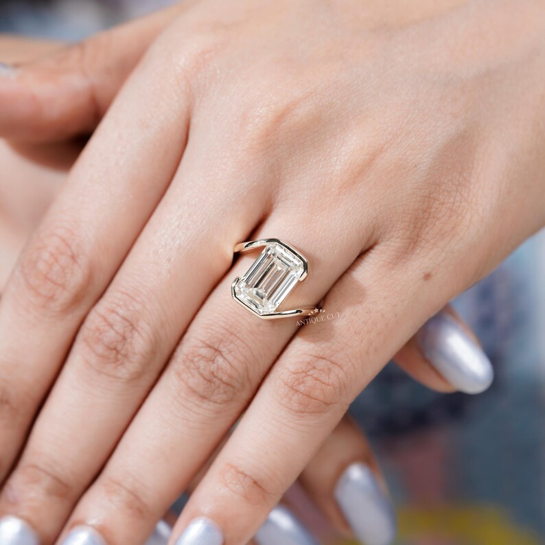 Contemporary emerald cut engagement ring