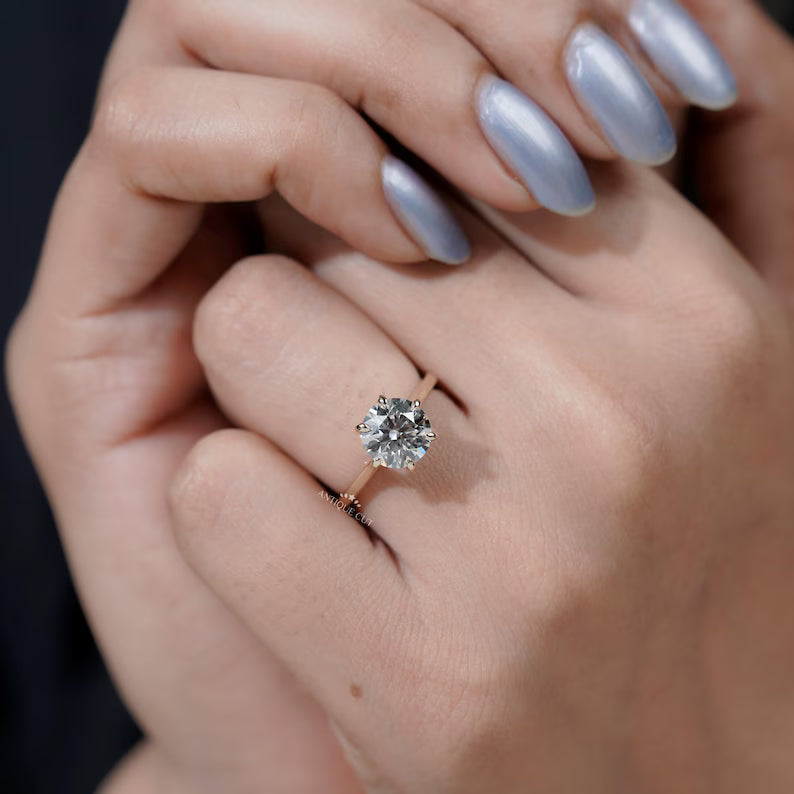 Modern 6 prong round cut diamond ring