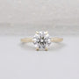 Round cut engagement ring with 6 prong solitaire