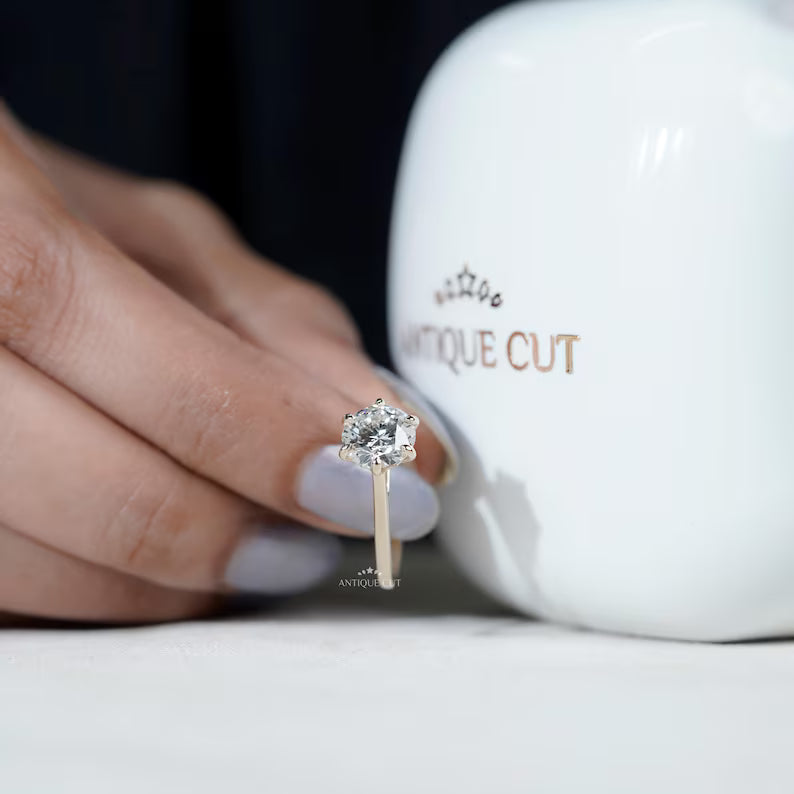 Timeless round cut engagement ring design