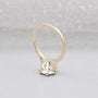 Minimalist round cut diamond engagement ring