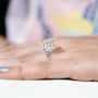 Classic cushion cut engagement ring with modern hidden halo