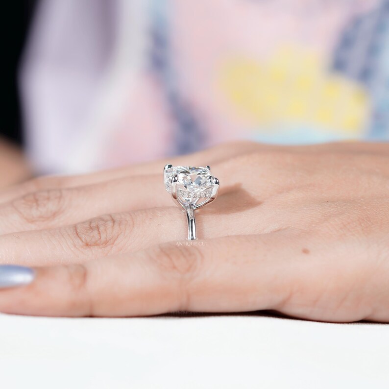 Classic cushion cut engagement ring with modern hidden halo
