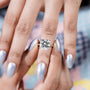 Statement cushion diamond ring with subtle halo effect