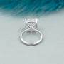 Cushion cut diamond ring with concealed halo design