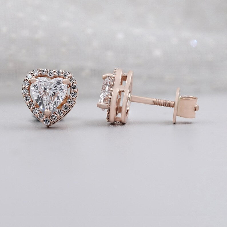 Romantic heart cut diamond earrings close up