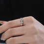 Unique east west emerald cut engagement ring modern luxury design