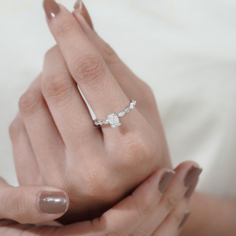 Timeless white gold emerald cut diamond ring pave band