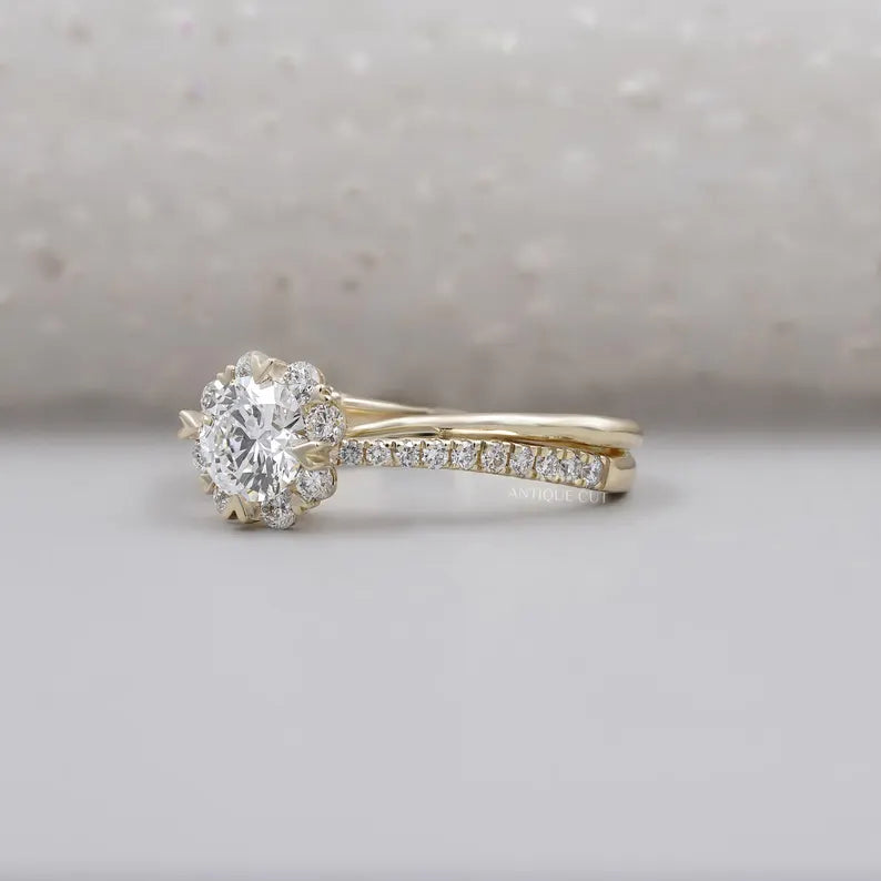 Twisted band ring with round cut diamond