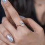 Modern oval diamond engagement ring rose gold pave band