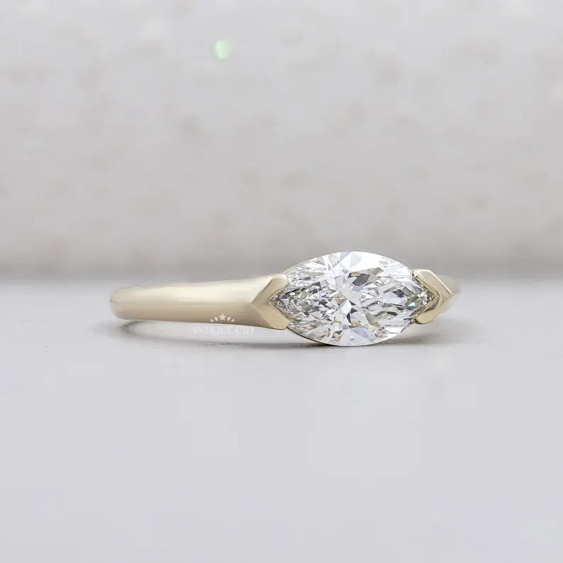 Horizontal marquise diamond ring yellow gold