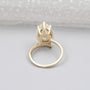 Elegant pear shape diamond ring yellow gold three stone design