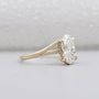 Yellow gold oval engagement ring hidden halo