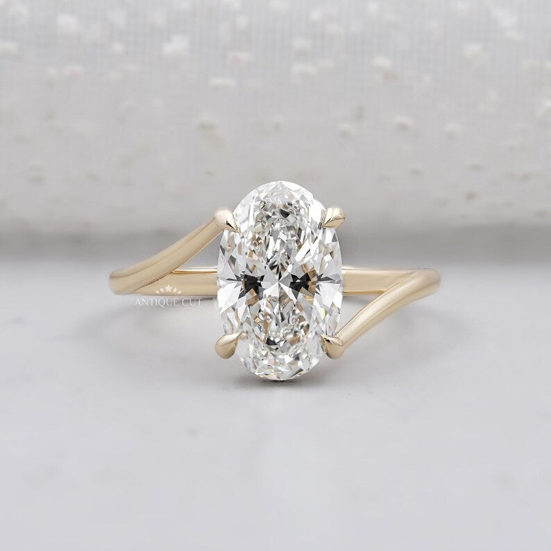 oval-cut-diamond-ring-split-shank-hidden-halo
