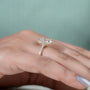 Contemporary oval diamond ring hidden halo pave band gold