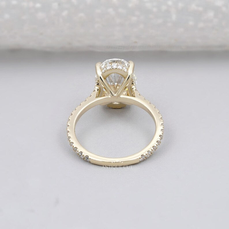 Elegant oval engagement ring hidden halo pave diamonds gold