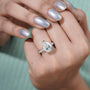 Refined pear diamond engagement ring pave halo white gold