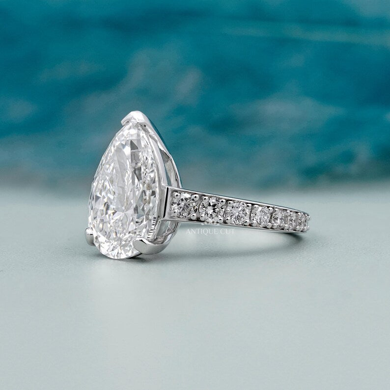 Lab grown pear diamond ring white gold pave band design