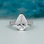 Pear shape diamond engagement ring white gold pave band