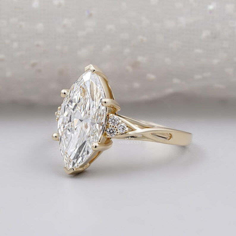 Vintage marquise diamond engagement ring yellow gold elegant design