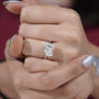 Timeless two stone engagement ring white gold emerald pear