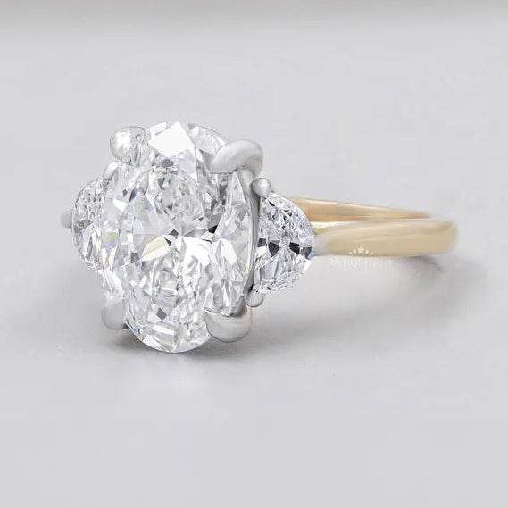 Yellow gold oval diamond ring three stone engagement ring