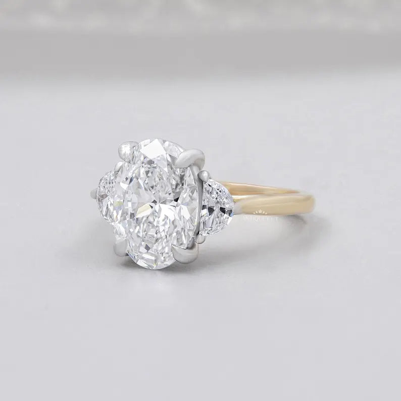 Yellow gold oval diamond ring three stone engagement ring