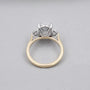 Elegant oval three stone engagement ring yellow gold design
