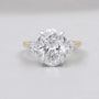 Oval cut three stone engagement ring yellow gold lab diamond