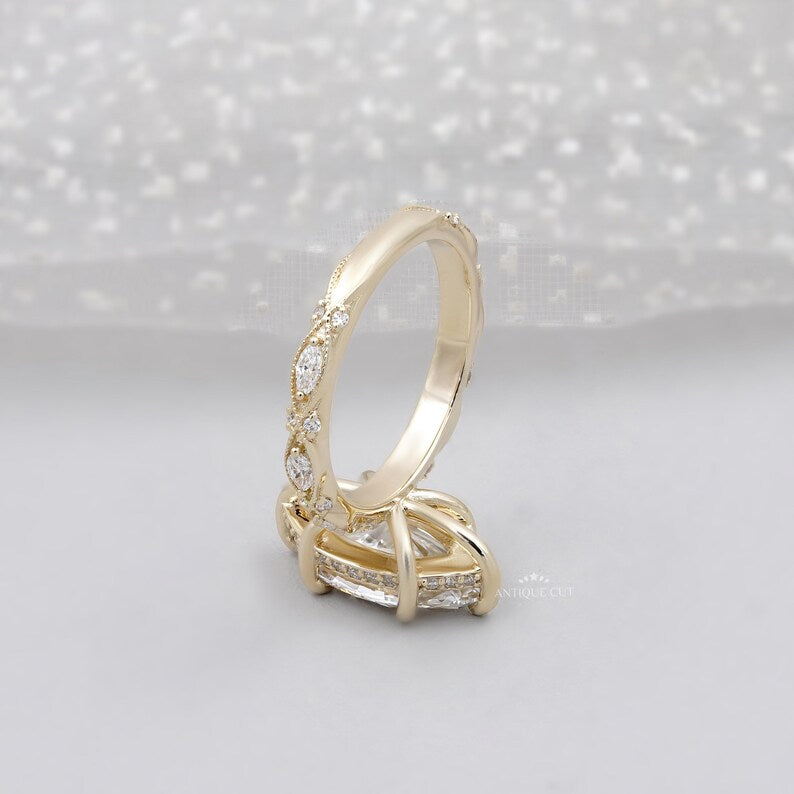 Elegant marquise engagement ring yellow gold vintage design